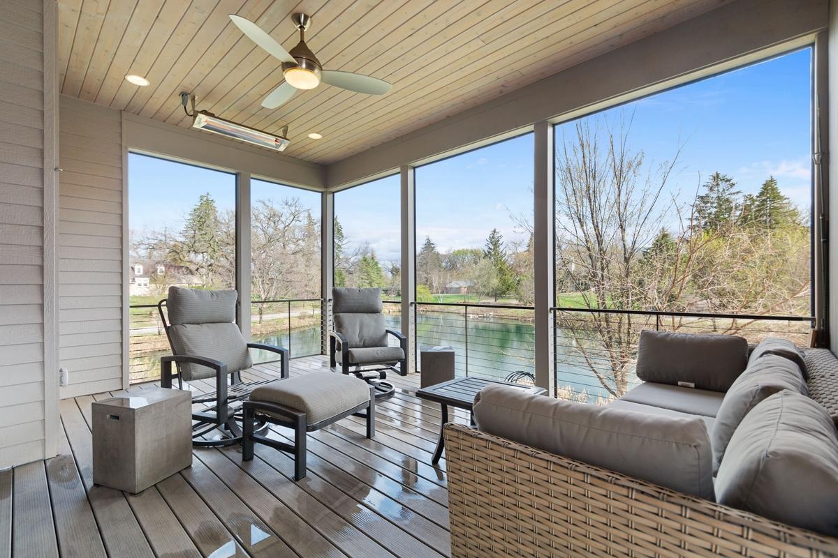 Gorgeous 3 season porch overlooking the pond