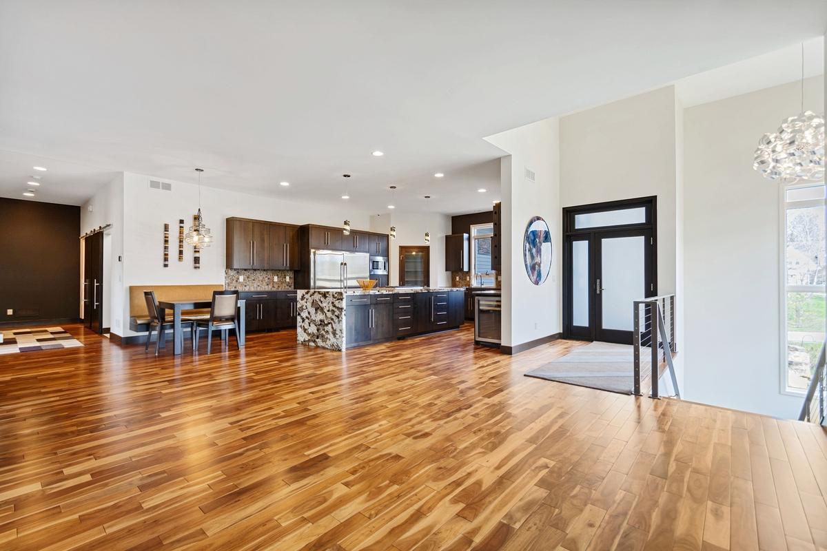 Large open entry and foyer, stairs on right lead to Lower Level.