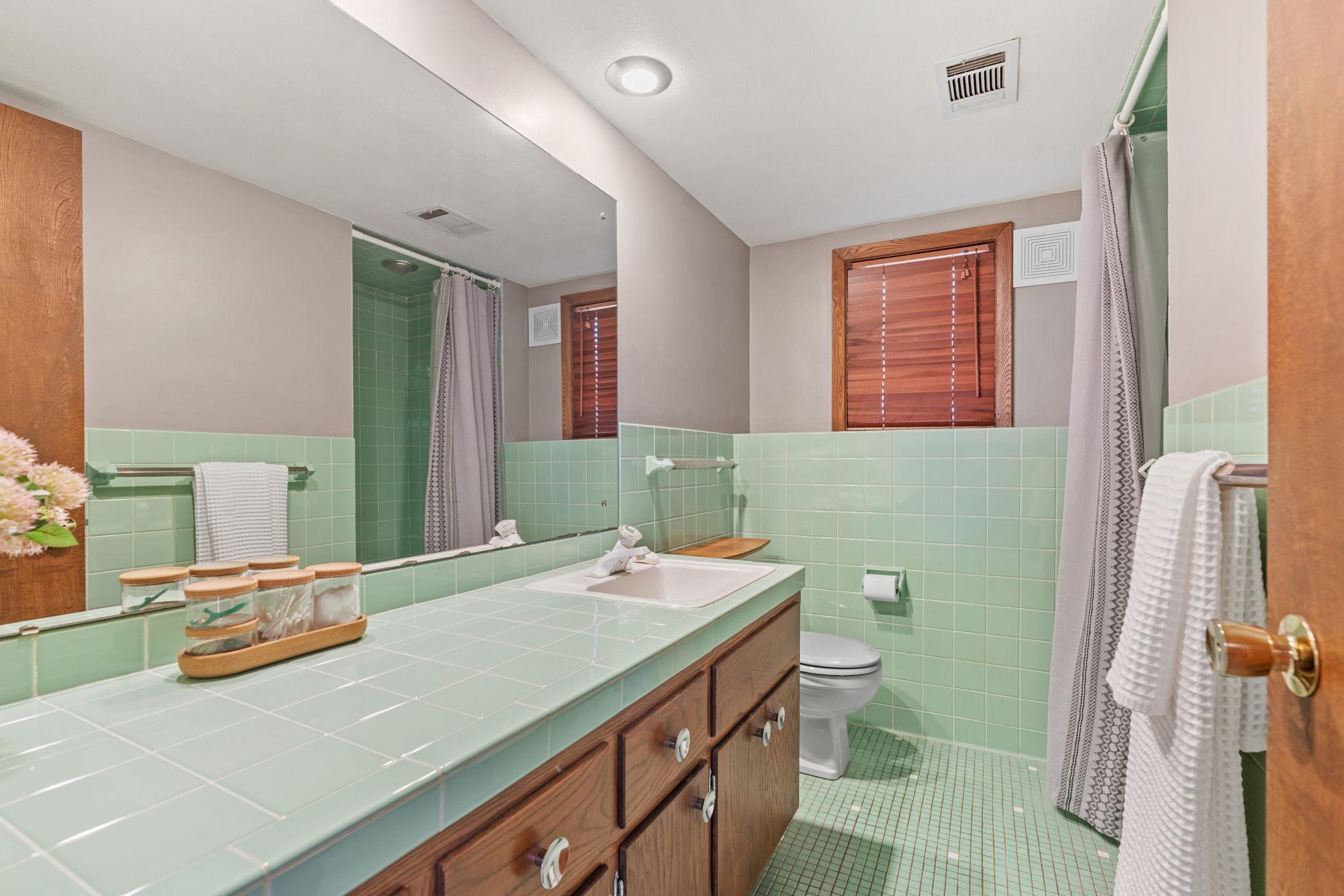 Pristine, original lower level 3/4 bath