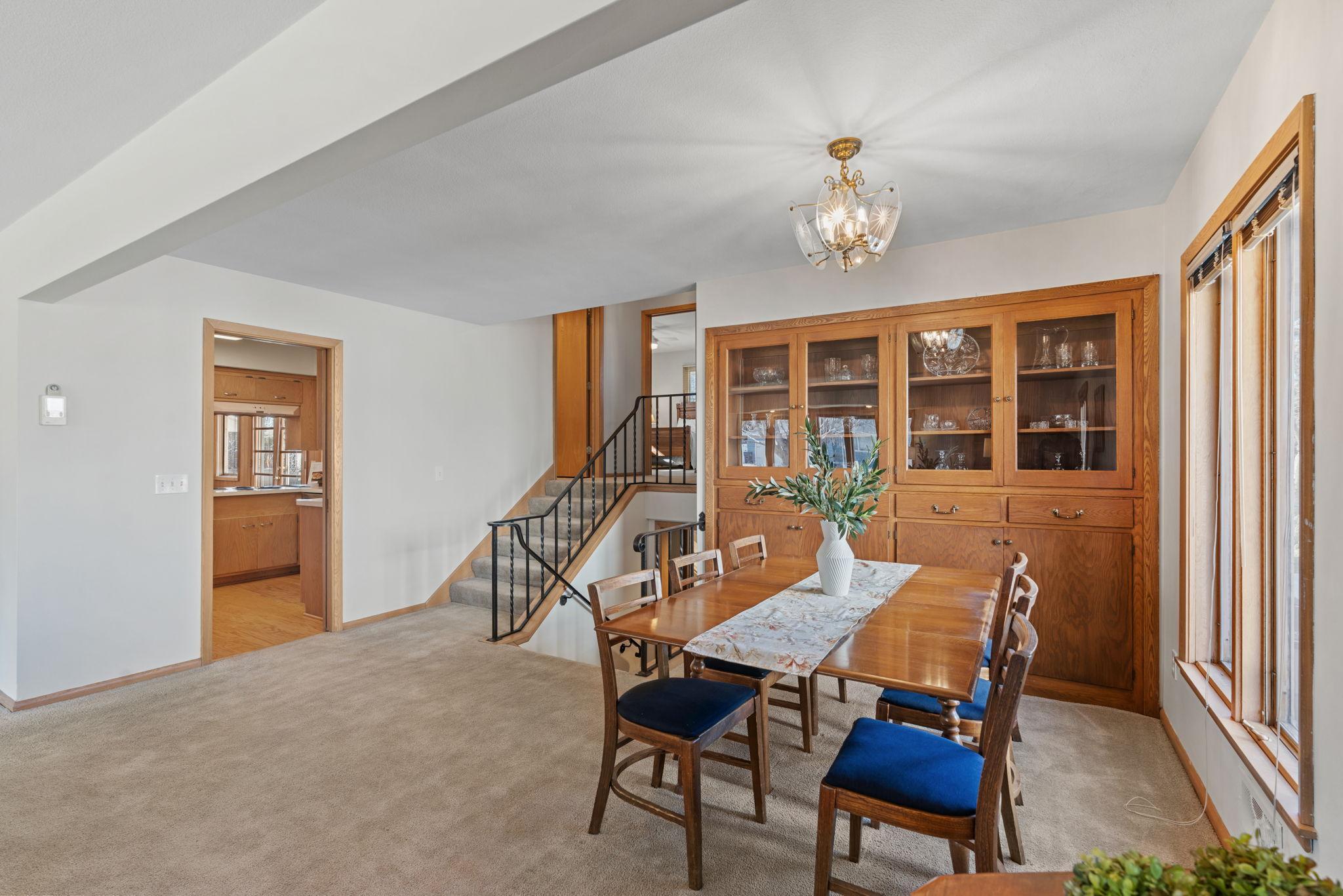 Formal dining space adjacent to living room