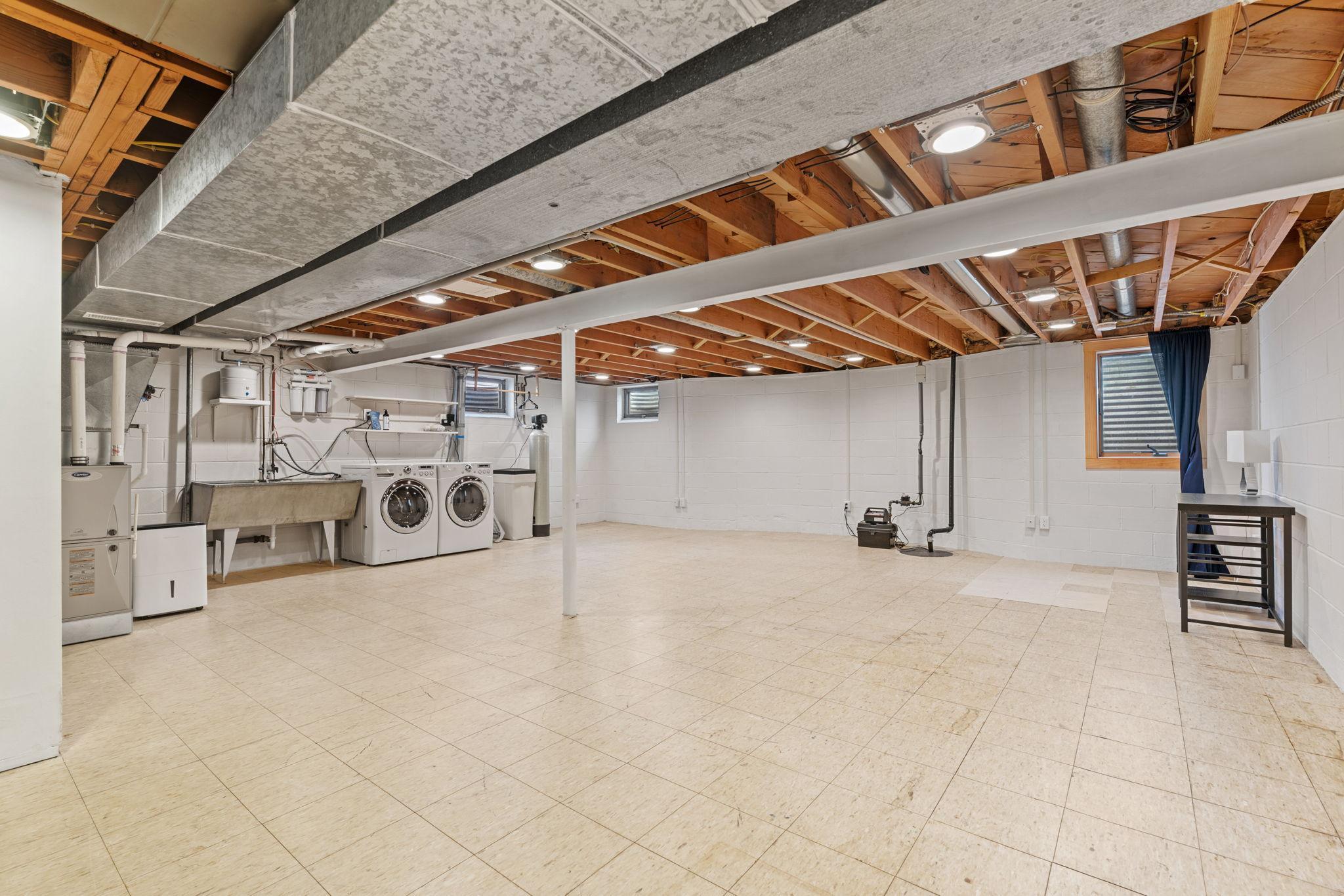 Lower level space has egress window and has been used for additional bedroom space, game room and office.