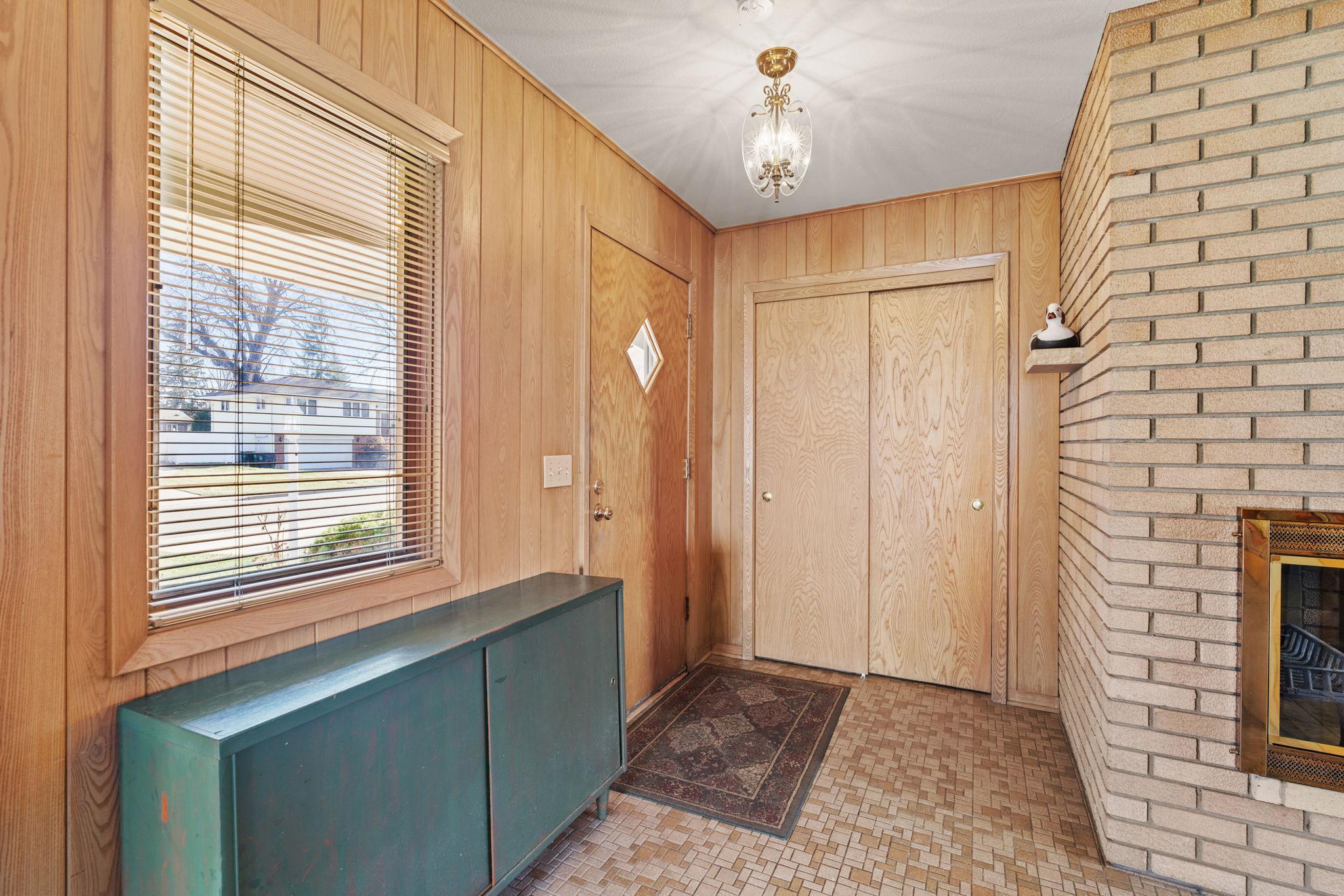 Large foyer with walk in coat closet