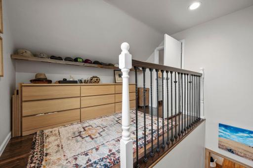 The upper level landing, on the way into the primary bedroom~