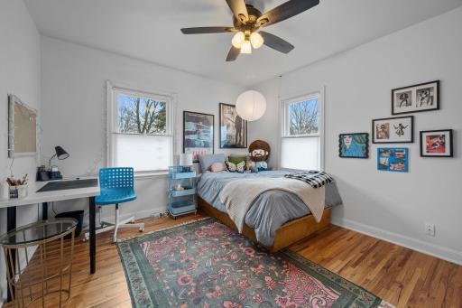 One of two bedrooms on the main floor. Hardwood floors and custom closet.