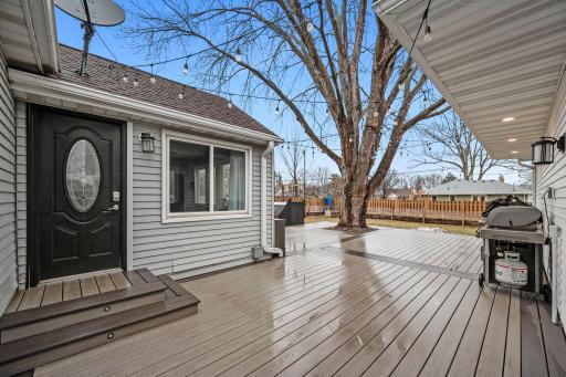 This is the door from the 4 season porch to the deck and backyard, connecting to the garage~