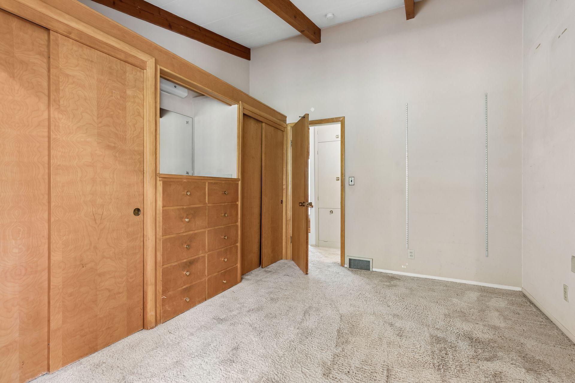 Office with built-in storage. Continuous vaulted ceiling.