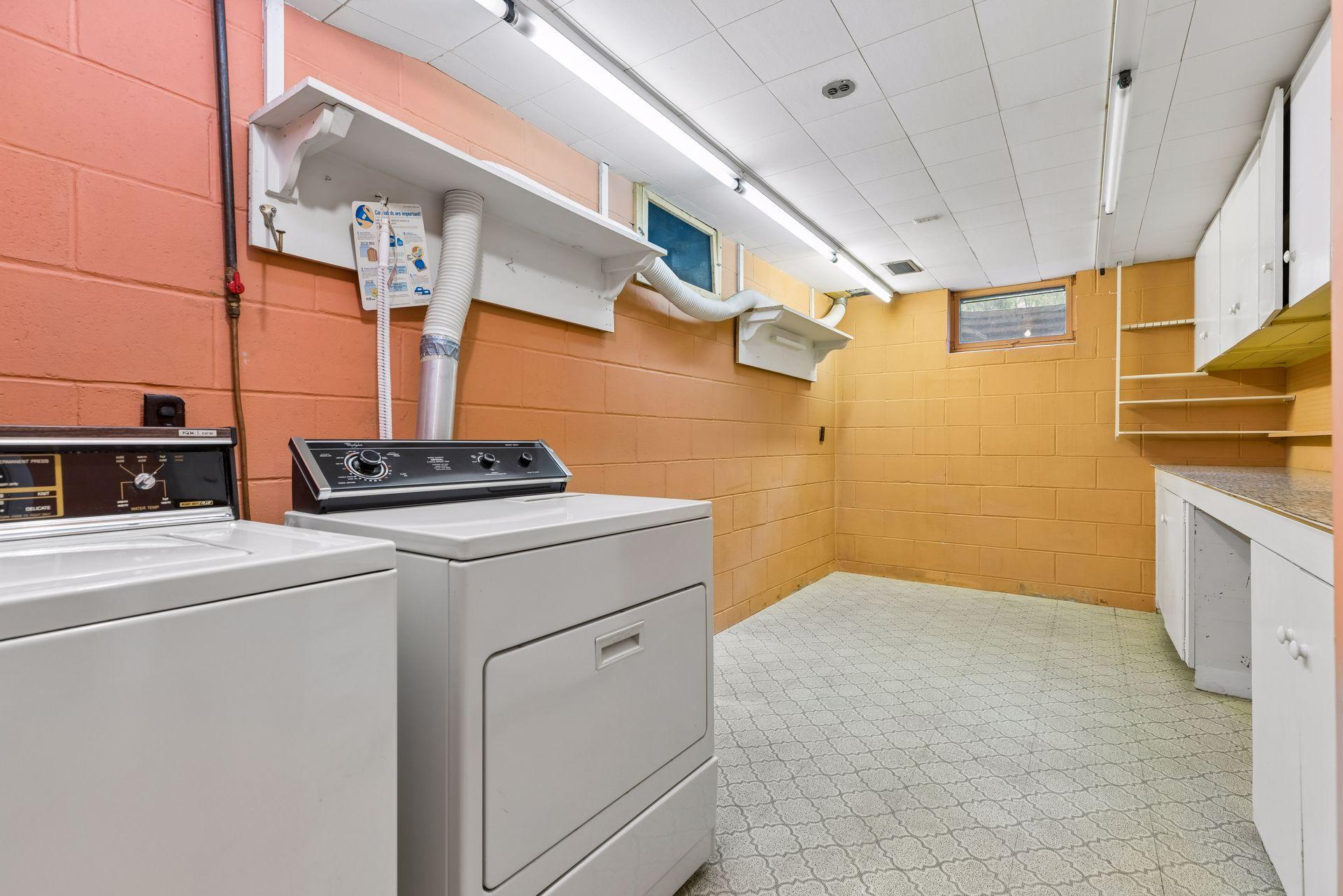 Lower level laundry and storage area.
