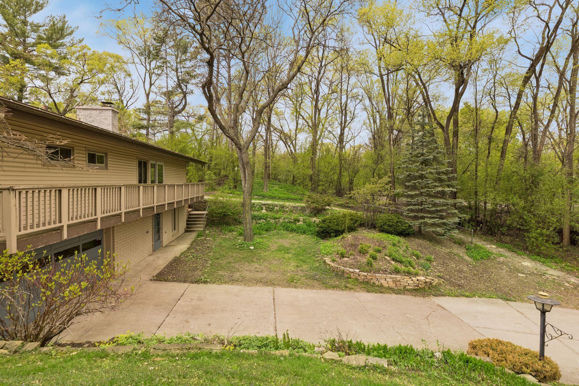 5217 Windsor Avenue a lovely private yard and site. Full expanse deck (needs replacing)