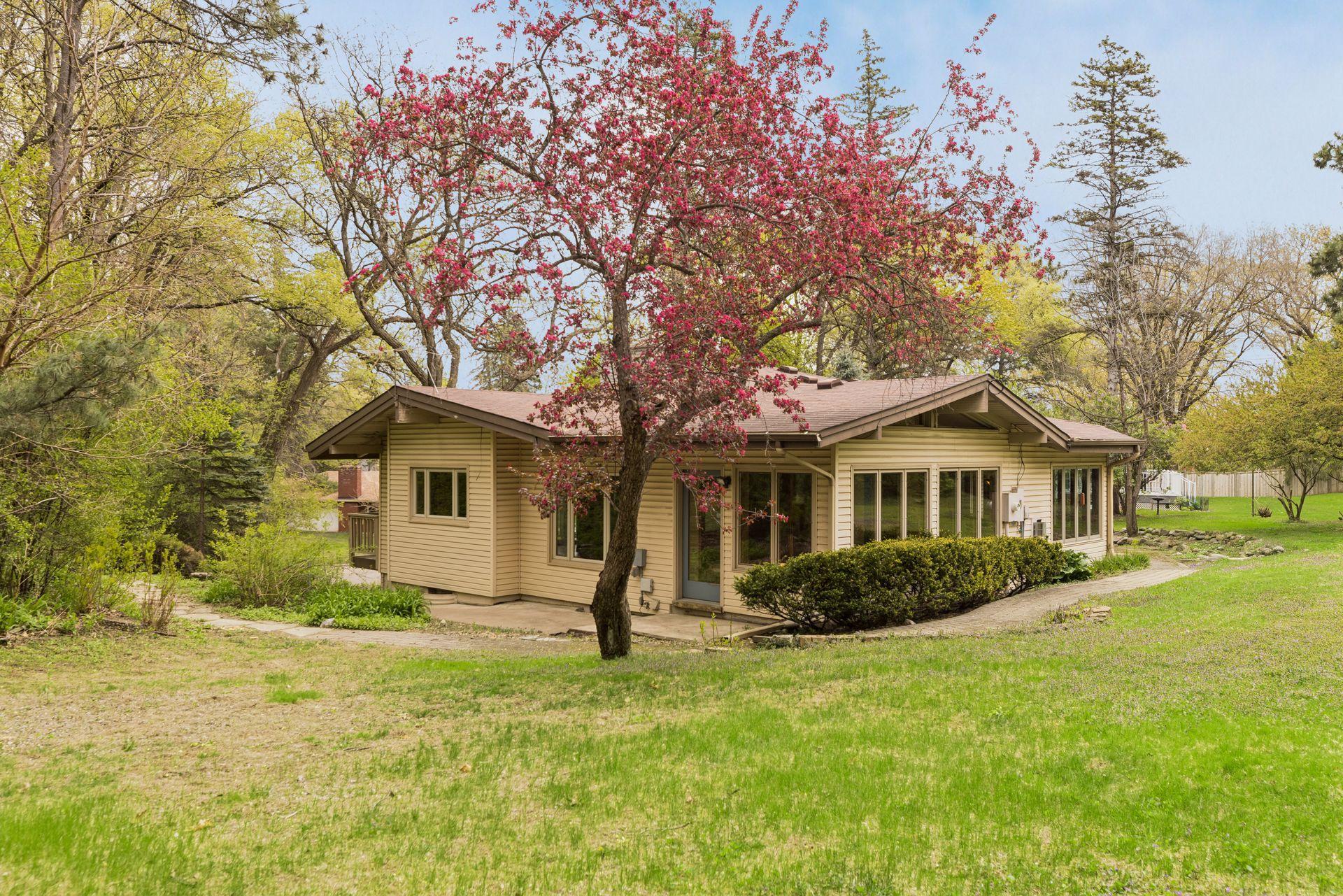 Lovely expansive and private backyard - mostly flat with some gentle slope.