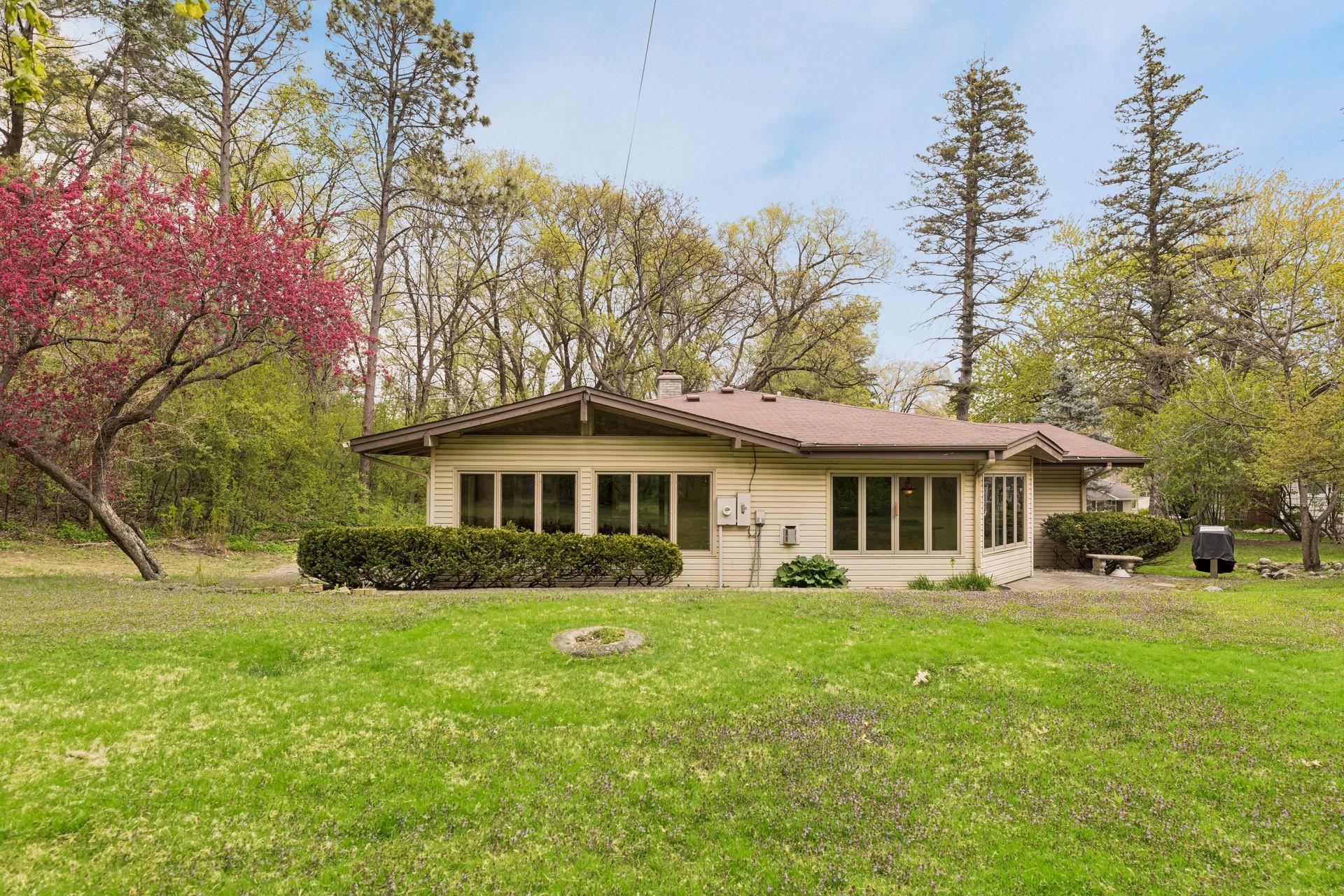 .54 acres and a private site - a quiet place to enjoy gardening, reading or a cup of tea. Also, new construction potential.
