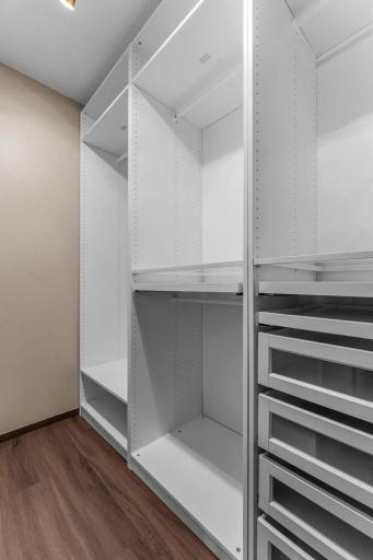 The primary also boasts a large walk-in closet with custom built-ins to accommodate your wardrobe.