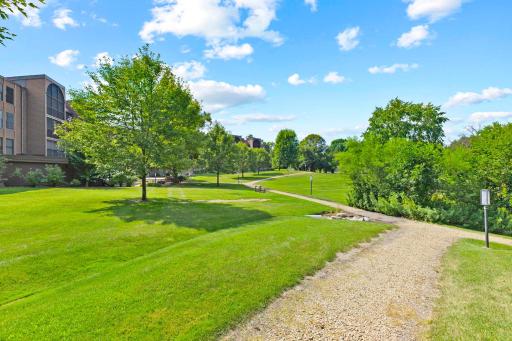 Enjoy many scenic walking paths throughout the community, winding around the pond.