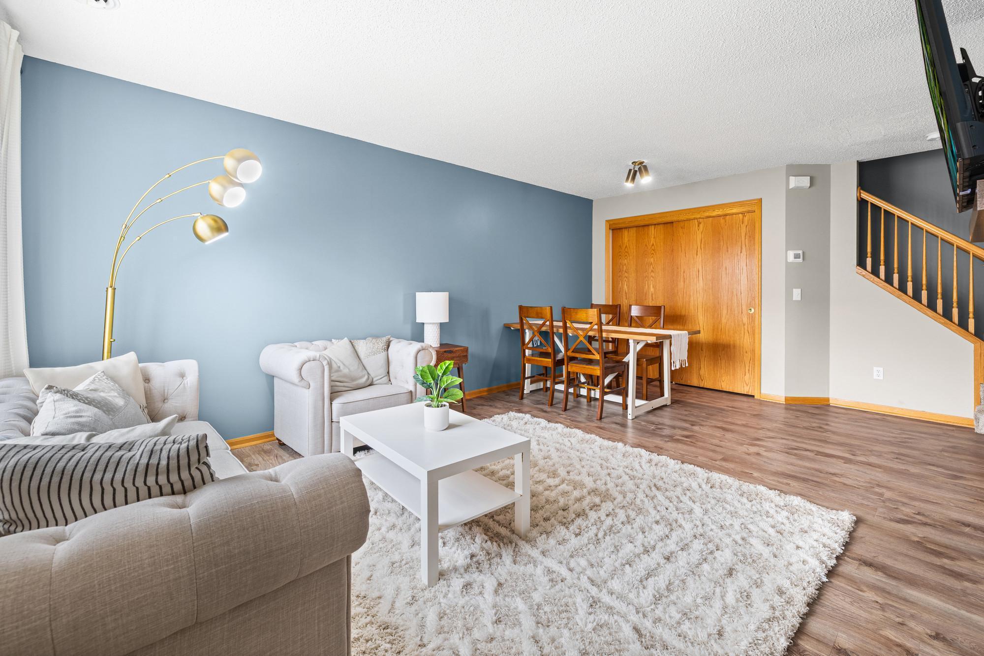 Sun-drenched living room as you enter the home