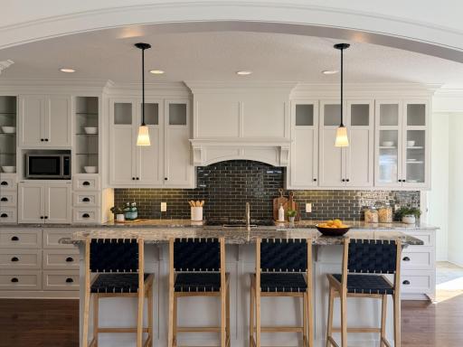 Designed for gathering, this kitchen blends warmth, function, and timeless style.