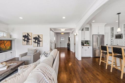 Rich hardwood floors flow seemlessly throught, connecting each living space in a warm, open design that invites you to move feely and live beautifully.