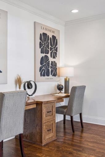 Custom built-ins and abundant natural light make this front office a standout feature. A refined space that proves function and beauty are never mutually exclusive.