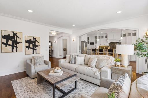 From the living room to the gourmet kitchen, the open concept design keeps conversation flowing, family connected, and every gathering feeling naturally effortless.