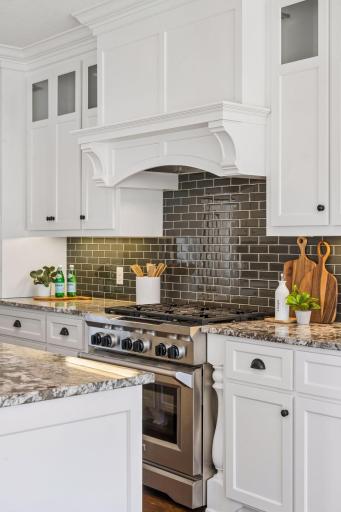 A professional-grade cooktop takes center stage, offering the power and position that serious home cooks demand. Built for everything from weeknight dinners to weekend feasts.