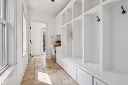 A smartly designed mud room with a custom locker system keeps even the busiest family organized and ready because a beautiful home works just as hard as it looks.