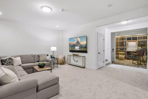 The Lore Level Family Room is an entertainer's dream expanse, inviting and designed with the flexibility to host game nights, movies, and everything in between.