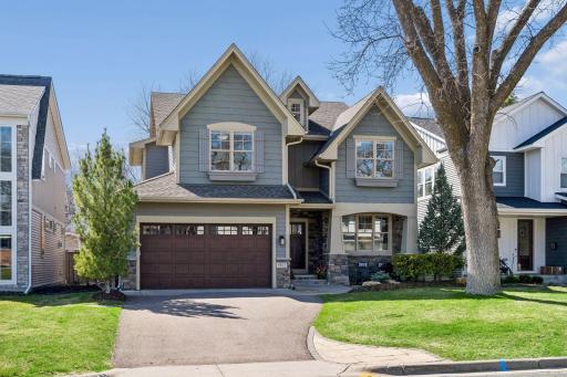 Nestled on a stunning tree-lined street, this home enjoys the kind of curb appeal and neighborhood charm that never goes out of style, the perfect setting for a life well lived.