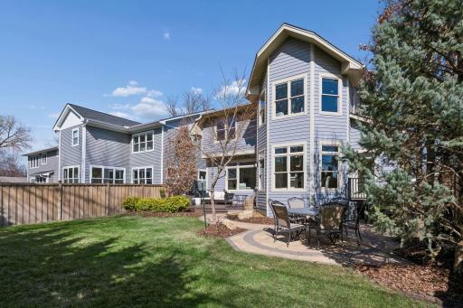 Professionally designed and meticulously maintained by Jim Hansen Landscaping, the grounds surrounding this home create a lush, polished setting that elevates the entire property from the moment you arrive.