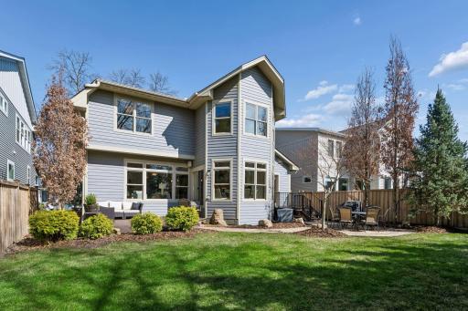 The expansive backyard offers generous space for outdoor living, play, and entertaining, a private beautifully landscaped retreat that feels worlds away from the everyday.