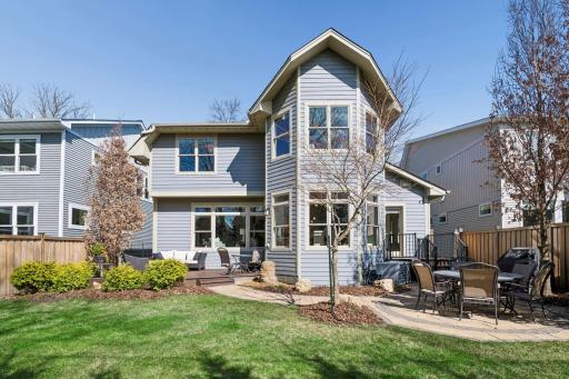From the privacy fence that creates a secluded backyard retreat to the professionally designed gardens and stone water feature, every inch of the outdoor space was crafted with intention and care.