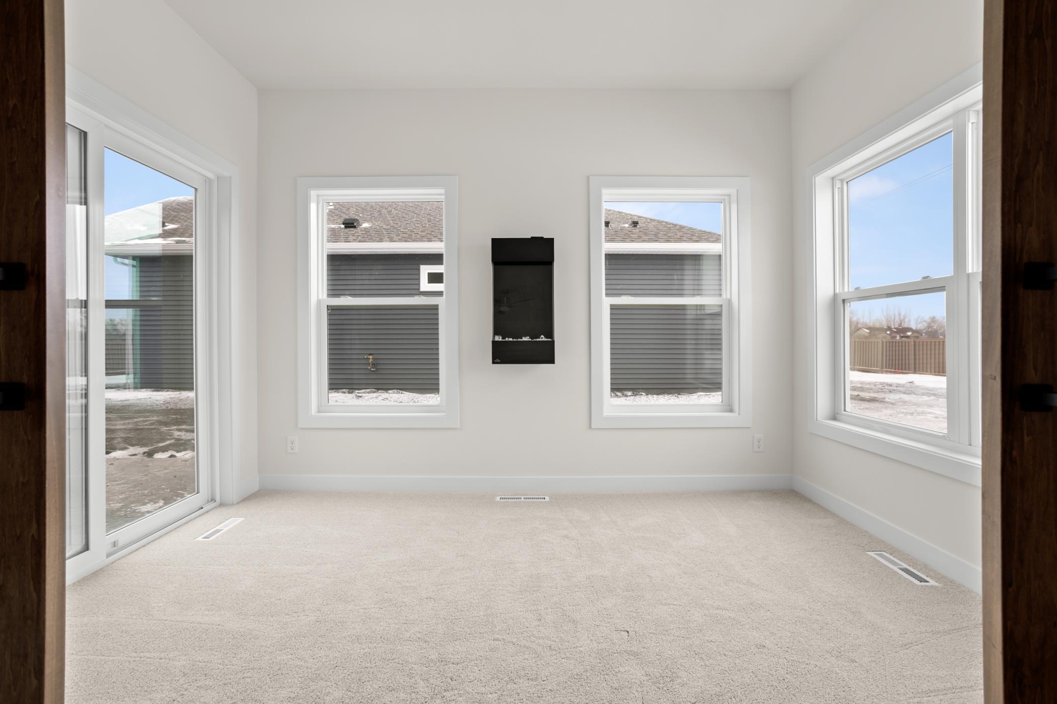 Sitting Room w/wall mounted electric Fireplace