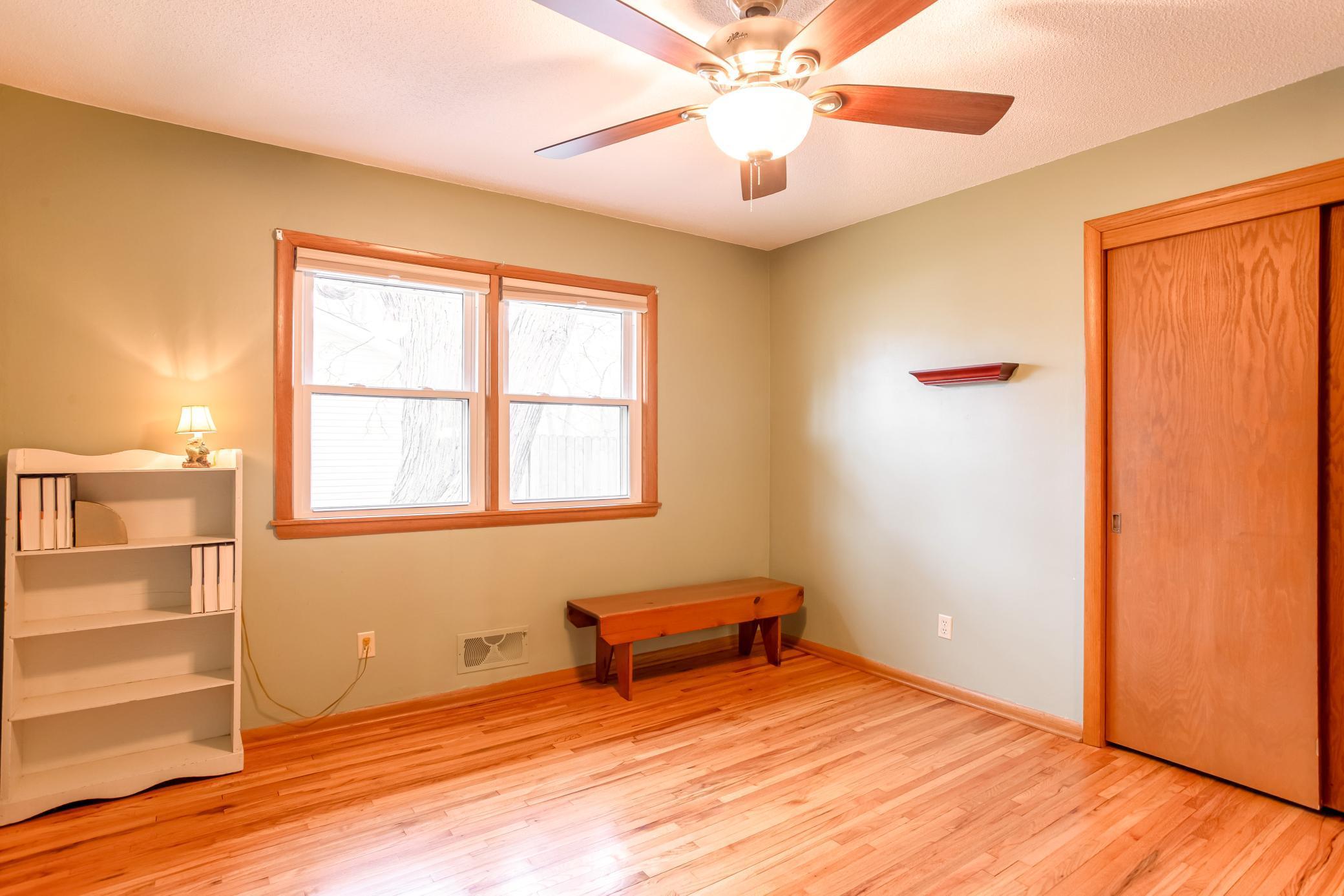 Bright and flexible bedroom space ideal for guests, office, or hobbies.