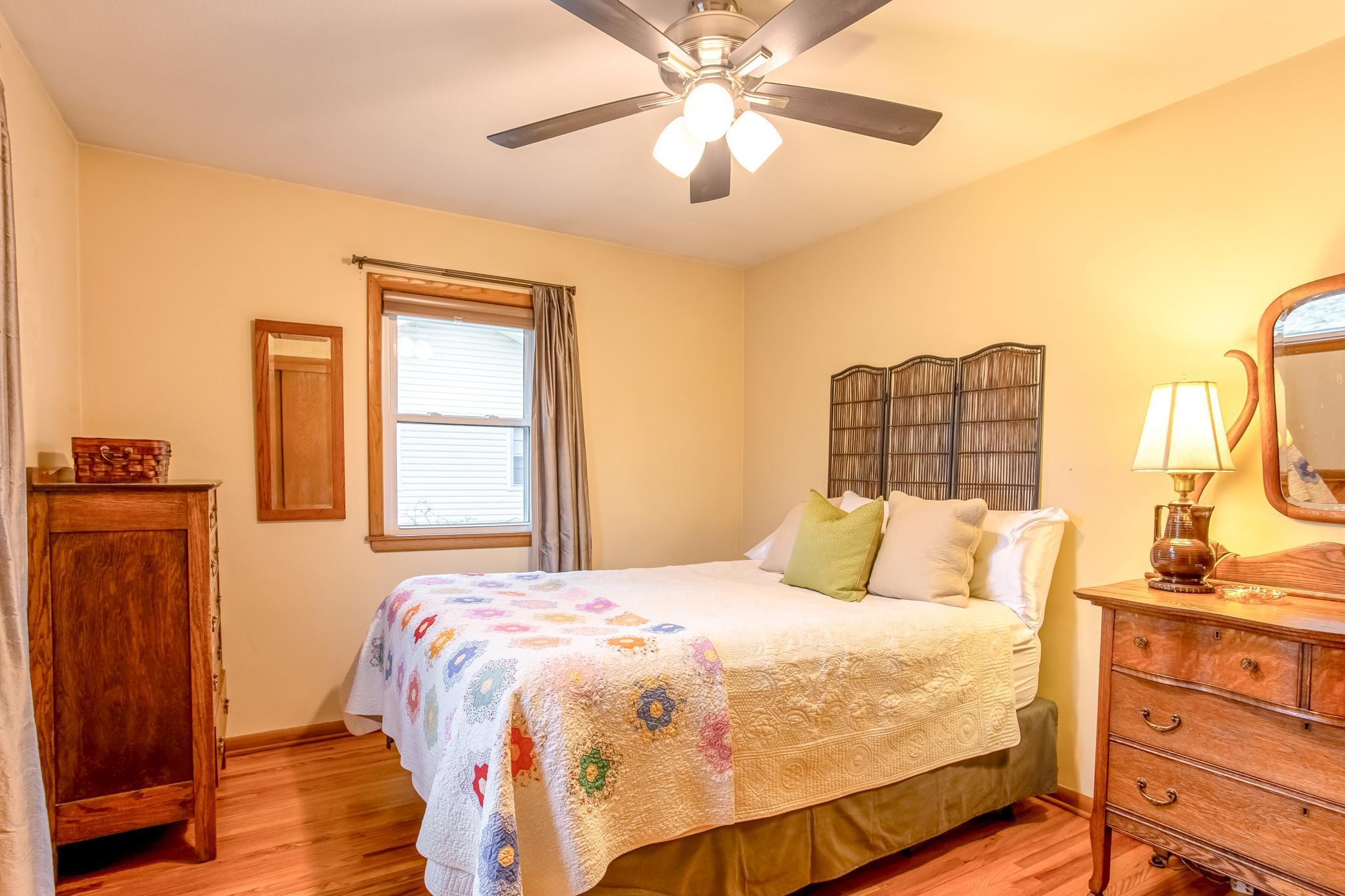 Comfortable primary suite with ample space and classic finishes.