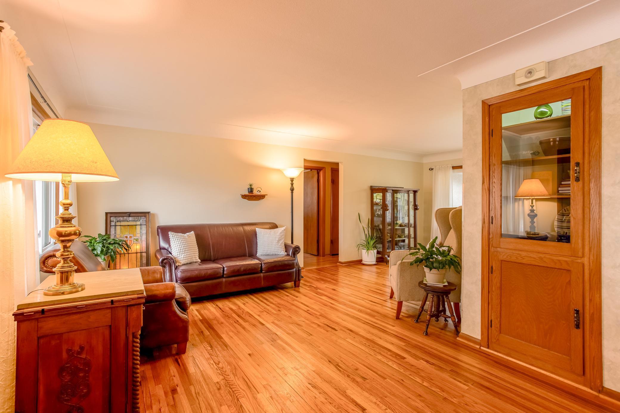 Comfortable living area featuring large windows and an open, welcoming layout.