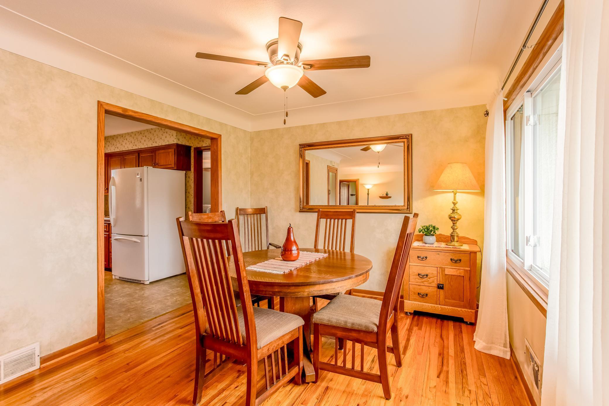 Inviting dining area with warm finishes, perfect for gatherings and everyday meals.
