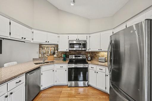 Bright and functional kitchen, offering plenty of storage and counter space