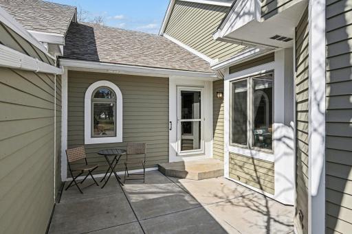 Inviting front porch with a private space to enjoy peaceful time outdoors