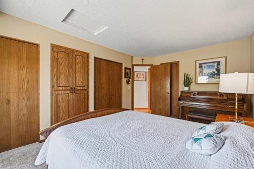 Upper-level bedroom with multiple storage options