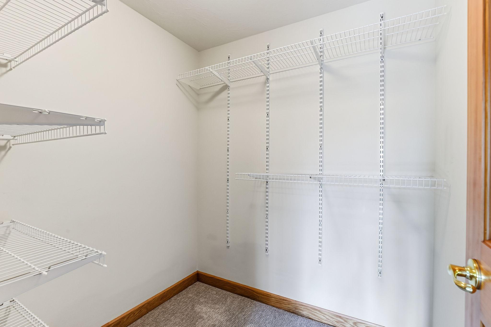 Each bedroom offers a comfortably sized closet, reinforcing the home’s strong storage design