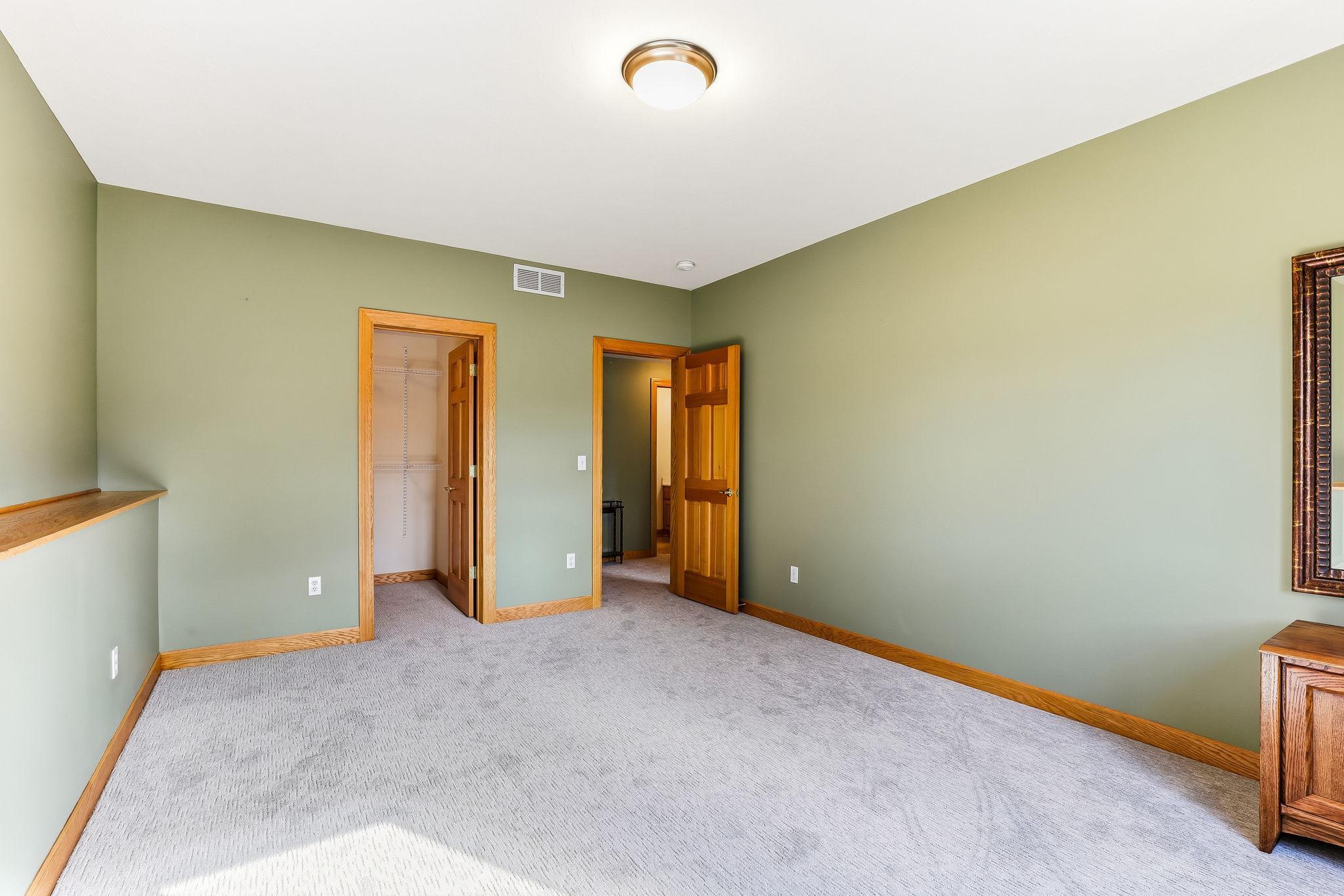 Warm, timeless oak-paneled doors carried through every room