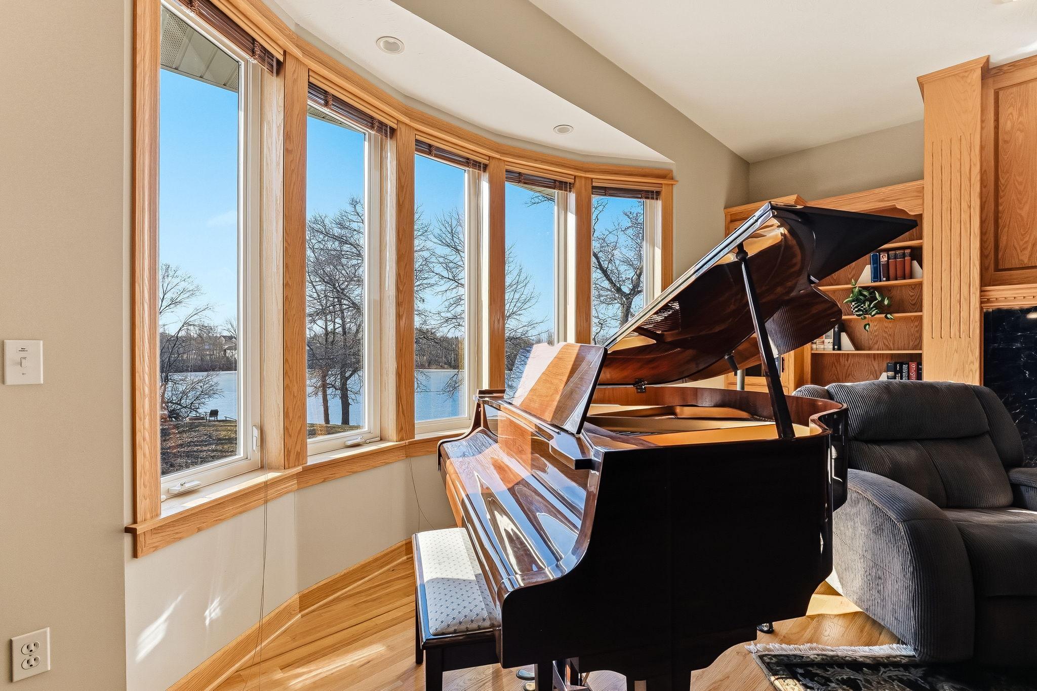Expansive bay window showcasing breathtaking lake views