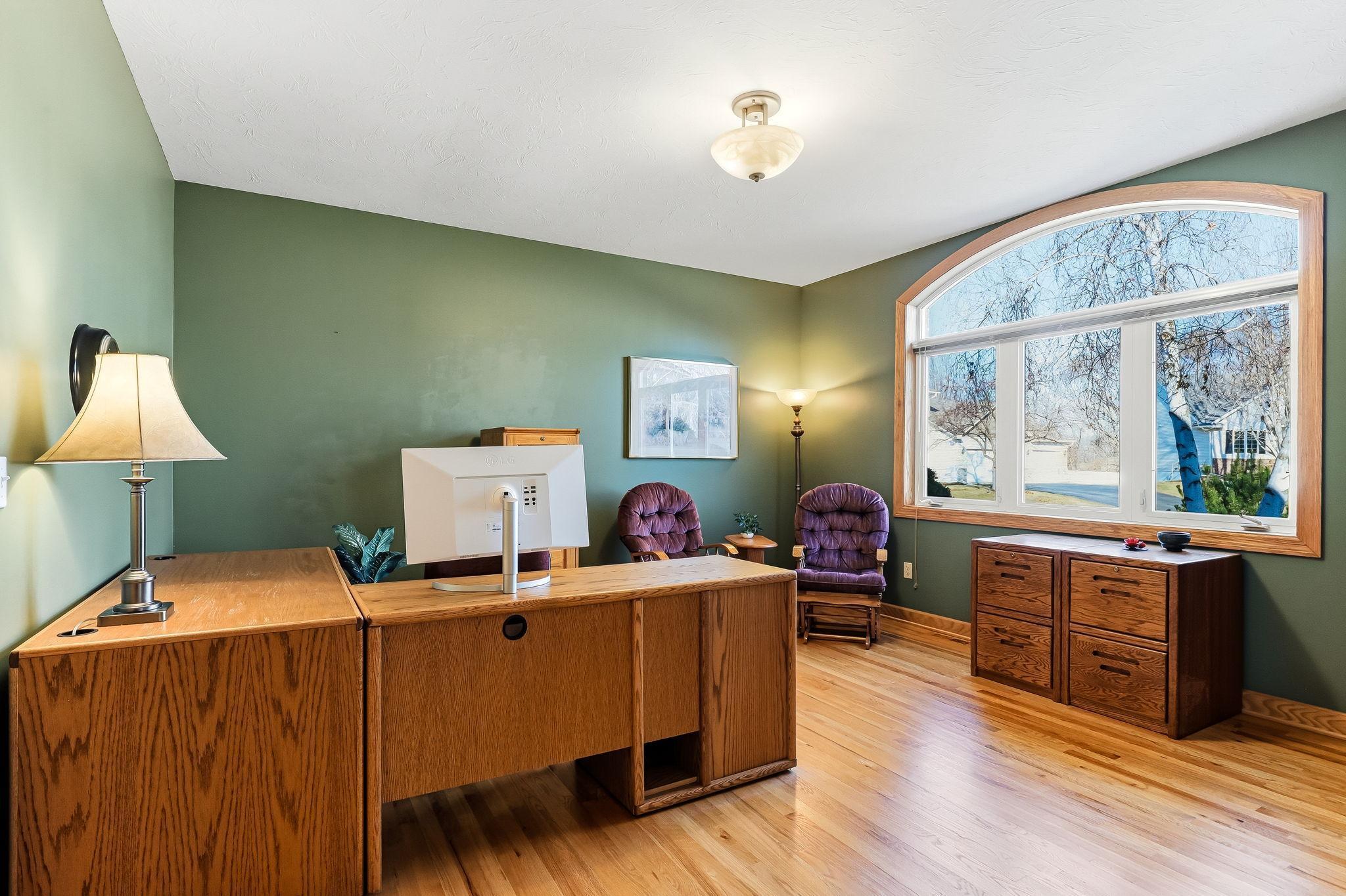 Main-level office with versatile design that can easily serve as a 6th bedroom.