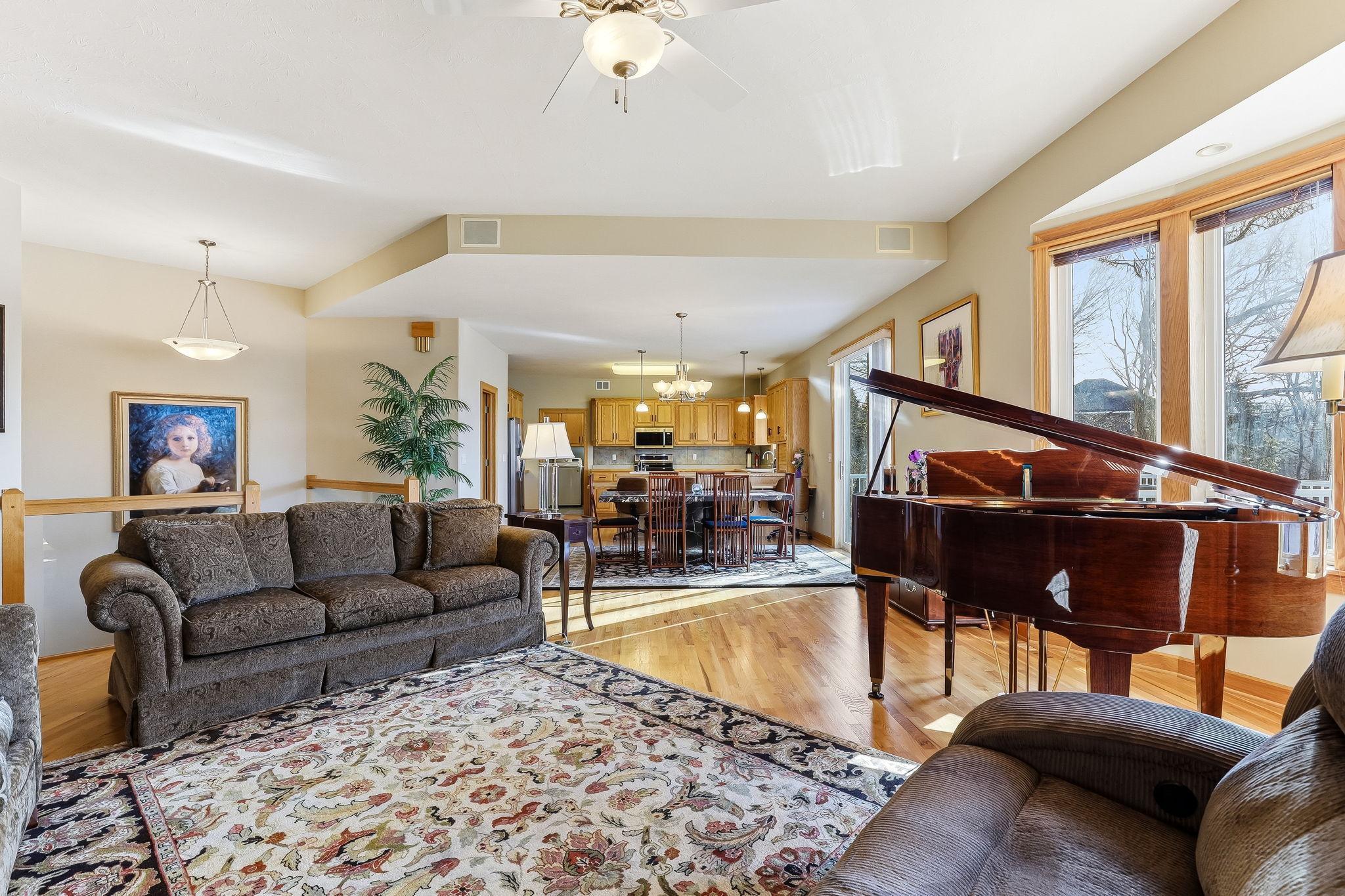 Gracefully connected living, dining, and kitchen spaces creating a refined open-concept flow