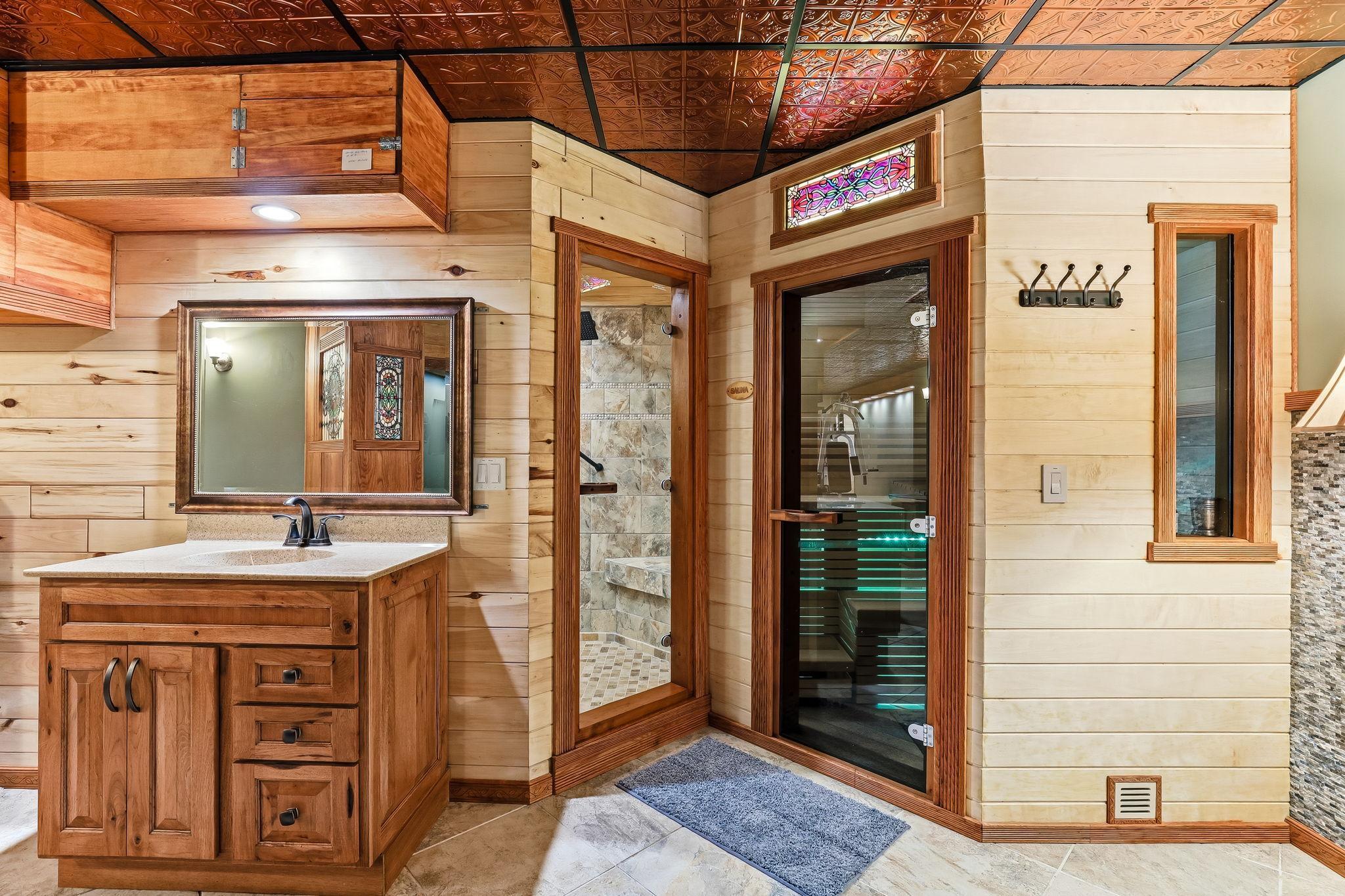 Beautifully designed sauna offering immediate access to the shower for effortless comfort.