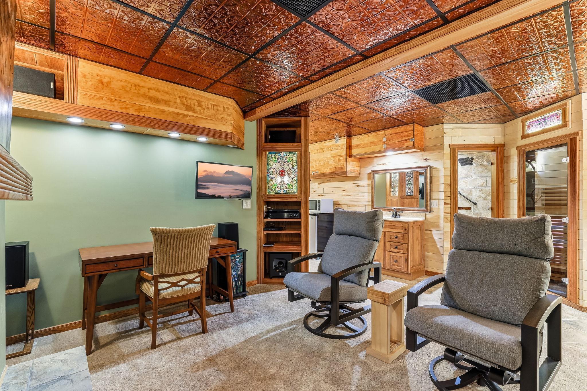 Newly installed stamped-tin dropped ceiling elevating the space with timeless detail.