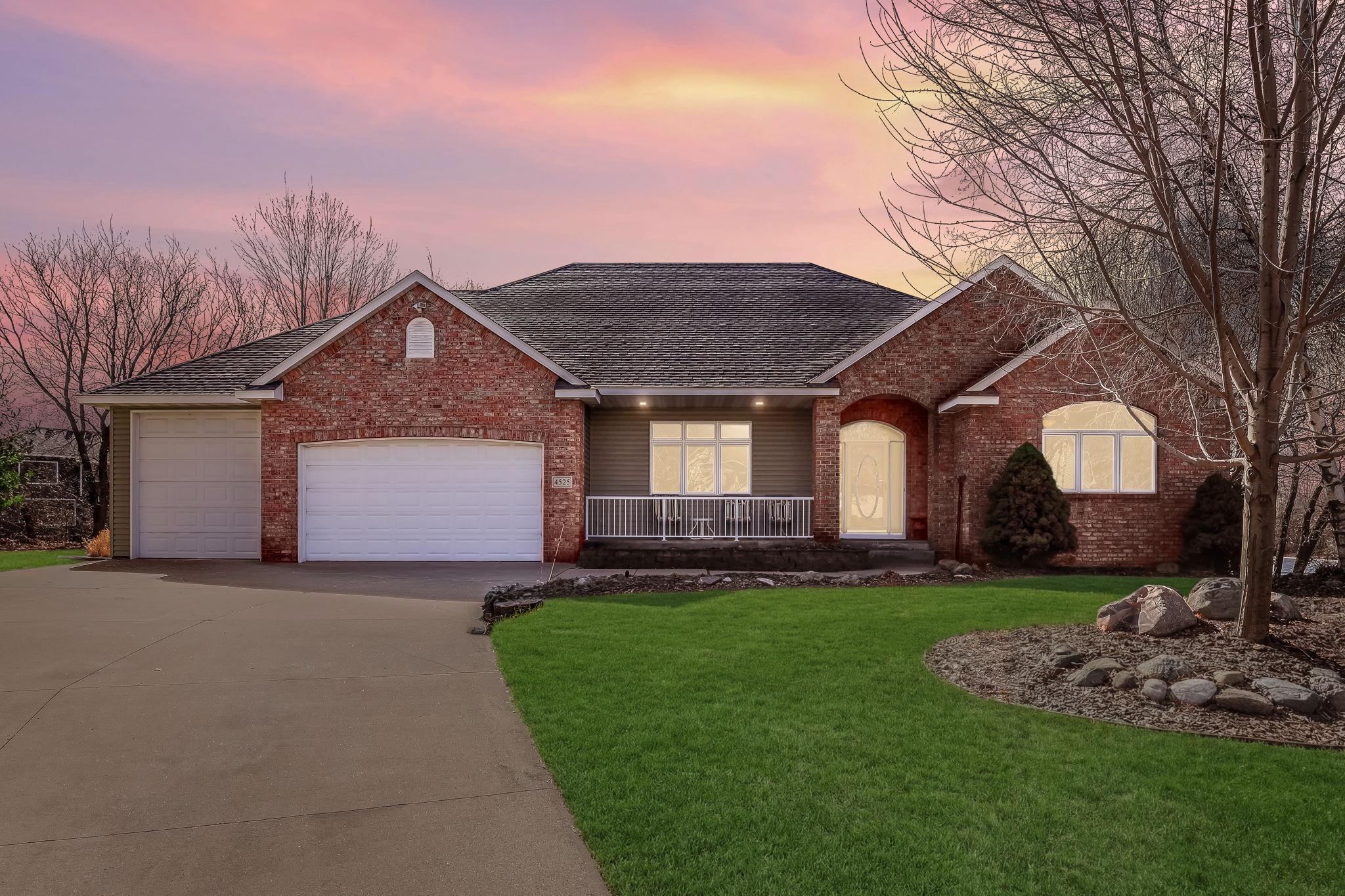 Nestled on a tranquil 1.39-acre cul-de-sac lot overlooking sweeping views of a private pond and pristine lake