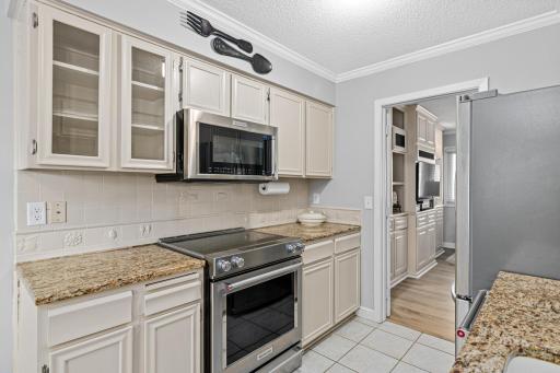 Kitchen features beautiful stainless steel appliances.