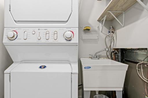 Laundry area right outside the bedrooms for ultimate convenience.
