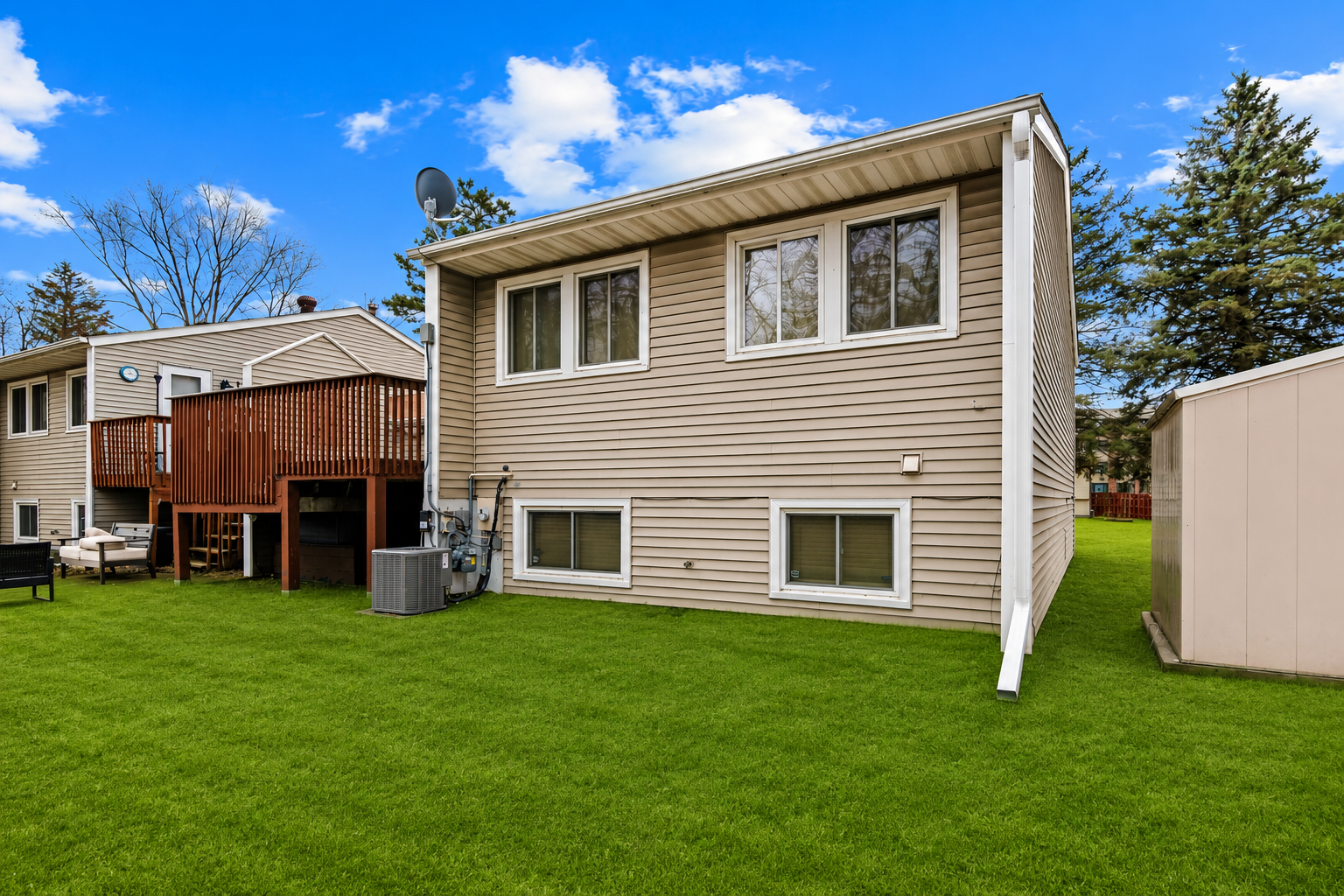 Back of house leads to large backyard.