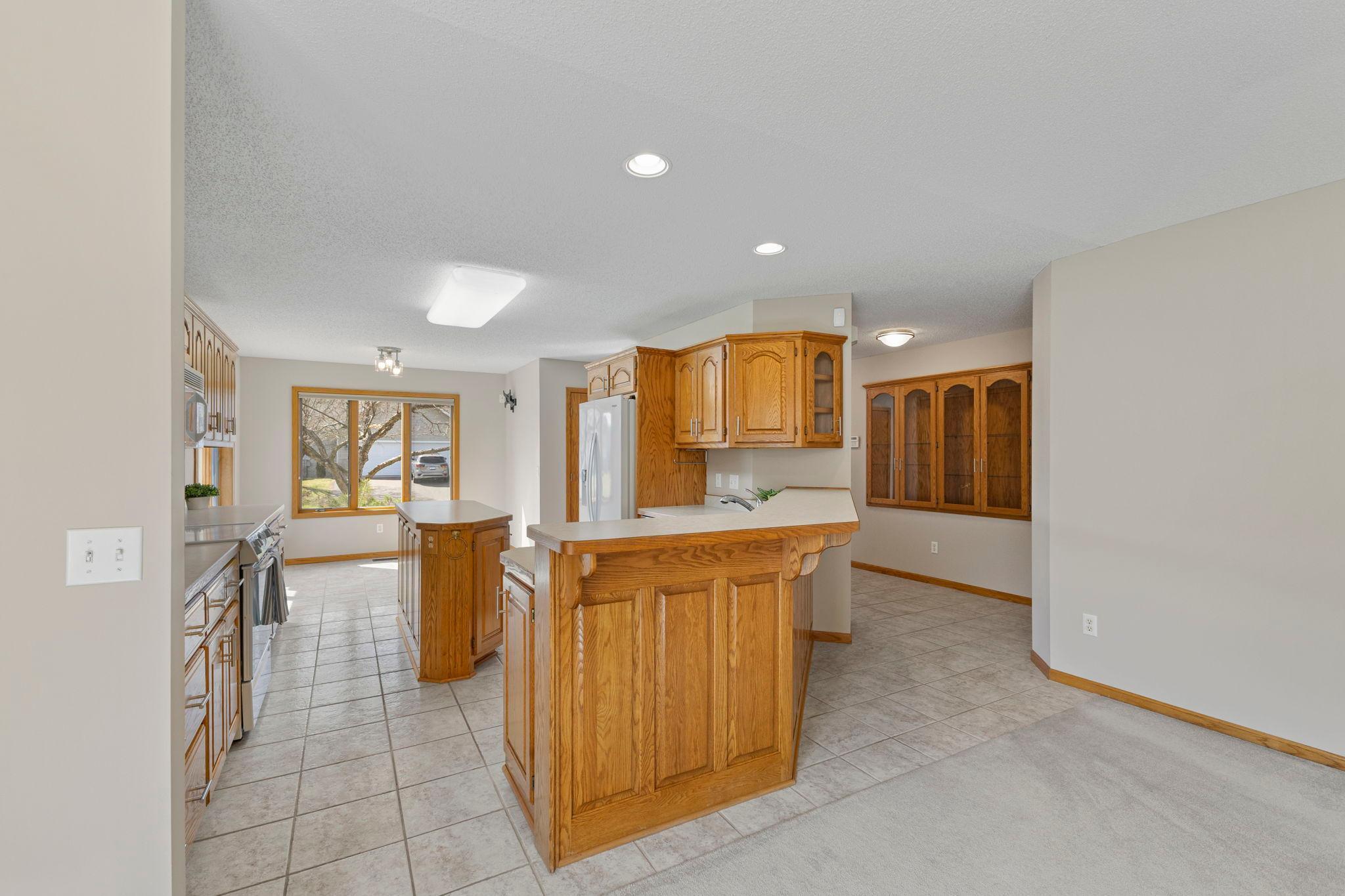 Highly desired open layout with the dining area, kitchen, living room, and 4-season porch all seamlessly connected.