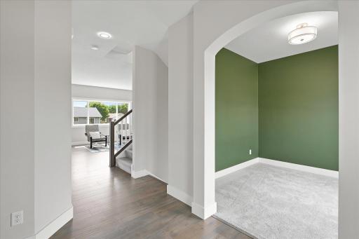 Flexible front room- ideal for a home office, playroom or cozy sitting area.