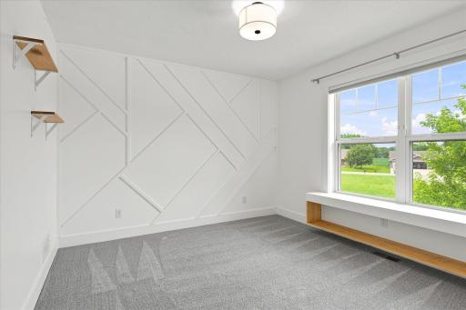 2nd upstairs bedroom has stylish built-in details.